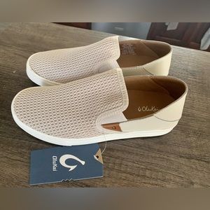 Brand new with tags Women’s Olukai slip on shoes. Size 7.5.